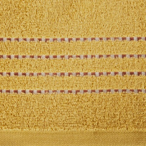 Ręcznik 30x50 Fiore musztardowy 500g/m2 frotte ozdobiony bordiurą w postaci cienkich paseczków Eurofirany Ręcznik 30x50 Fiore musztardowy 500g/m2 frotte ozdobiony bordiurą w postaci cienkich paseczków Eurofirany