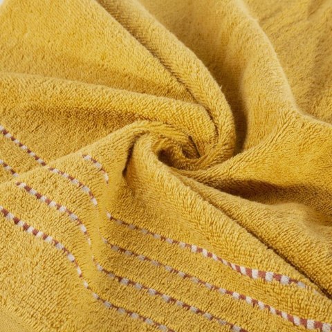Ręcznik 30x50 Fiore musztardowy 500g/m2 frotte ozdobiony bordiurą w postaci cienkich paseczków Eurofirany Ręcznik 30x50 Fiore musztardowy 500g/m2 frotte ozdobiony bordiurą w postaci cienkich paseczków Eurofirany